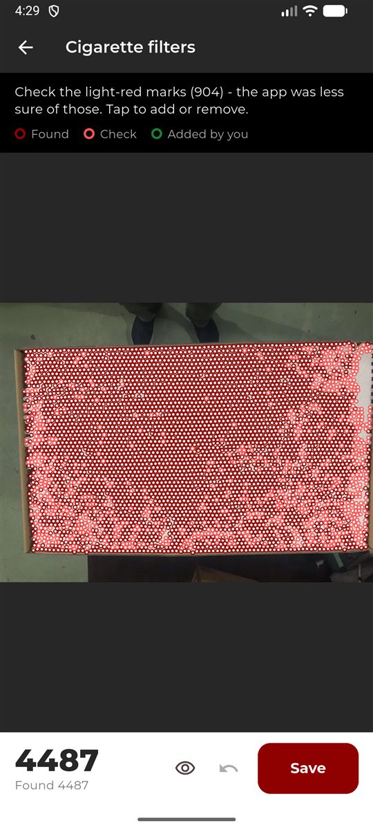 4,487 cigarette filters marked on a carton photo, with a colour legend for found, check and added marks